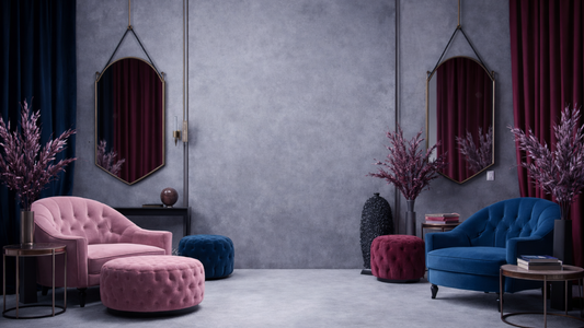 Modern living room with pink and blue chairs, ottomans, and decorative plants.